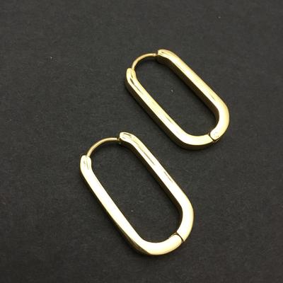 Gold tone oval hoop earrings