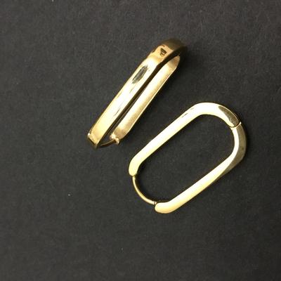 Gold tone oval hoop earrings