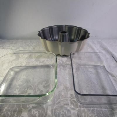 Sale Photo Thumbnail #237: One pan is 8"x 6" the other is 8" x 8", bundt pan is 9-1/2 in diameter