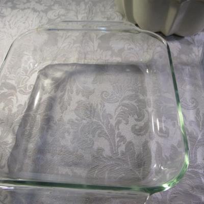 Sale Photo Thumbnail #238: One pan is 8"x 6" the other is 8" x 8", bundt pan is 9-1/2 in diameter