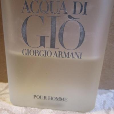 Sale Photo Thumbnail #564: Armani Attitude 3/4 bottle, Armani Code 1/2 bottle, Armani Acqua Di Gio 1/2 bottle, see pictures