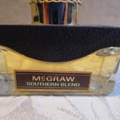 Sale Photo Thumbnail #585: McGraw Southern Blend, McGraw , McGraw Silver, all bottles mostly full, see pictures