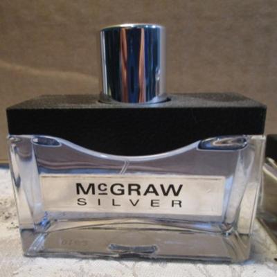 Sale Photo Thumbnail #587: McGraw Southern Blend, McGraw , McGraw Silver, all bottles mostly full, see pictures