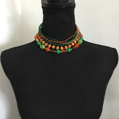 Beautiful, vintage, multi strand Lucite type bead necklace with beautiful clasp, gold toned