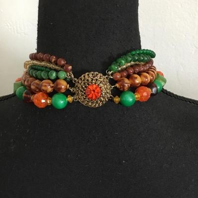 Beautiful, vintage, multi strand Lucite type bead necklace with beautiful clasp, gold toned