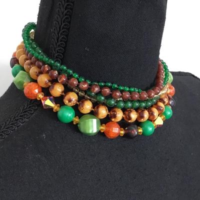 Beautiful, vintage, multi strand Lucite type bead necklace with beautiful clasp, gold toned