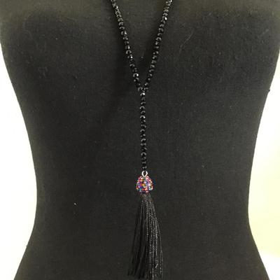 Beautiful jet black faceted, glass bead, multi colored rhinestone tassel necklace