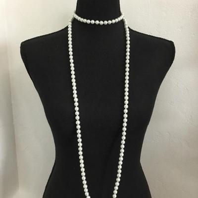 Beautiful very nice double knotted White faux pearl, long flapper style necklace