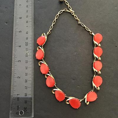 Sale Photo Thumbnail #127: Beautiful vintage thermal Lucite, orange necklace. Please see attached photos.