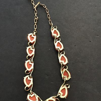Sale Photo Thumbnail #128: Beautiful vintage thermal Lucite, orange necklace. Please see attached photos.