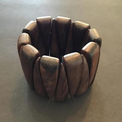 Sale Photo Thumbnail #6: Very nice wood carved stretchy bracelet. No wear please see attached photos.