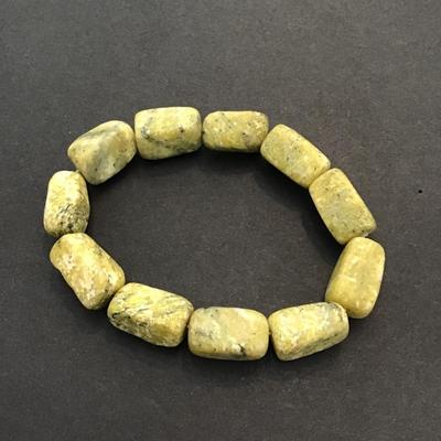 Sale Photo Thumbnail #28: Very nice green polished stone stretchy bracelet. Please see attached photos.