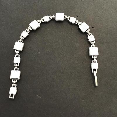 Sale Photo Thumbnail #45: Beautiful Silvertone faux plastic stone tennis bracelet. Please see attached photos.