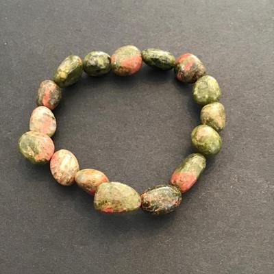 Sale Photo Thumbnail #60: Beautiful, green polished stone stretchy bracelet. Please see attached photos.