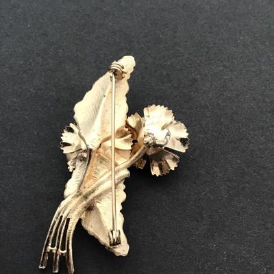 Sale Photo Thumbnail #141: Vintage, goldtone fashion brooch has some wear are blemishes. Please see attached photos.