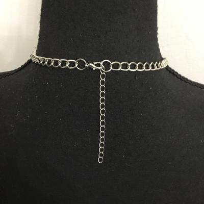 Cute, silver toned, statement, necklace