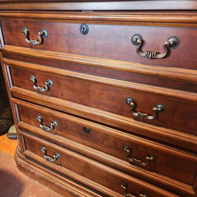 Sale Photo Thumbnail #59: Cherry wood credenza featuring dimensions of 3.5 x 1.9 x 2.6. Includes four spacious drawers with decorative metal handles. The credenza showcases intricate carving details along its edges, a polished finish, and a rectangular top. Designed with functiona