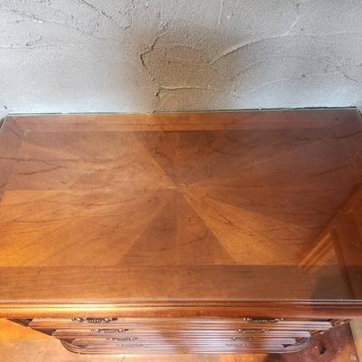 Sale Photo Thumbnail #76: Cherry wood credenza featuring dimensions of 3.5 x 1.9 x 2.6. Includes four spacious drawers with decorative metal handles. The credenza showcases intricate carving details along its edges, a polished finish, and a rectangular top. Designed with functiona