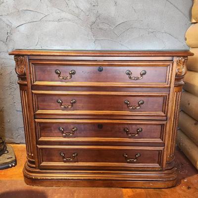 Sale Photo Thumbnail #122: Cherry wood credenza featuring dimensions of 3.5 x 1.9 x 2.6. Includes four spacious drawers with decorative metal handles. The credenza showcases intricate carving details along its edges, a polished finish, and a rectangular top. Designed with functiona