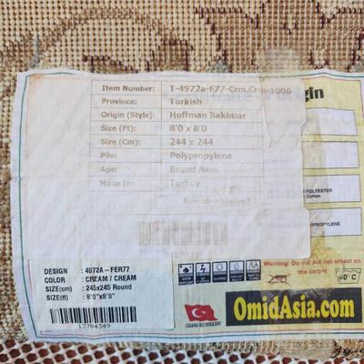 Sale Photo Thumbnail #141: Round Hoffman Bakhtiar-style rug, measuring approximately 6â€™8â€³ in diameter (208 cm). Made in Turkey using polypropylene material for durability and ease of maintenance. Features an intricate floral and vine design in neutral tones, including 