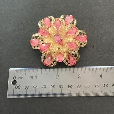 Sale Photo Thumbnail #21: Vintage very rare, pink rhinestone lucite filigree flower shaped brooch. Please see attached photos.