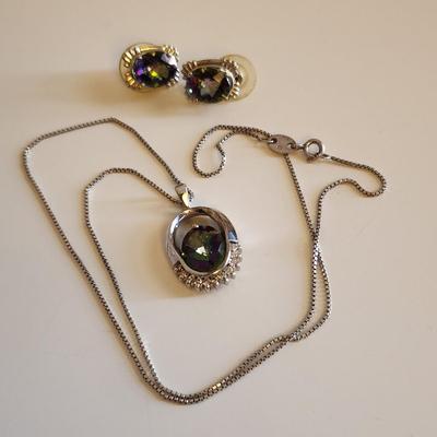 Sale Photo Thumbnail #18: This auction lot is for a set of Sterling Silver & Mystic Topaz Necklace and Earrings.  The necklace is about 18-inches long. The Mystic Topaz stones are clear and brilliant with the usual Aurora Borealis effect the stones have. All are marked 925.  What 