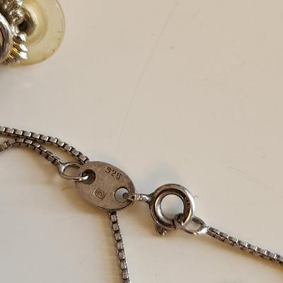 Sale Photo Thumbnail #21: This auction lot is for a set of Sterling Silver & Mystic Topaz Necklace and Earrings.  The necklace is about 18-inches long. The Mystic Topaz stones are clear and brilliant with the usual Aurora Borealis effect the stones have. All are marked 925.  What 