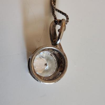 Sale Photo Thumbnail #24: This auction lot is for Four Sterling Silver Necklaces. Three necklace are marked 925.  There is a 16-inch necklace with a large cut glass stone, another 14-inch necklace with a pendant of silver overlay on jade stone, a very delicate 17-inch chain with a