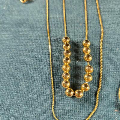 Sale Photo Thumbnail #48: This auction lot is for Vintage "Add a Bead" Necklaces. This is a pair of "Add a Bead" necklaces that were popular in the late 70's.  We recall you could purchase and add as many beads as you wanted or could afford.  If we remember correctly the chains we