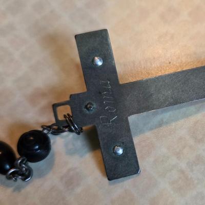 Sale Photo Thumbnail #78: This auction lot is for a Black Beaded Rosary. This is a very nice Black Beaded Rosary..  It has Rome etched on the back of the cross,  This most likely was used for a young man's First Communion.  It is in very good condition.