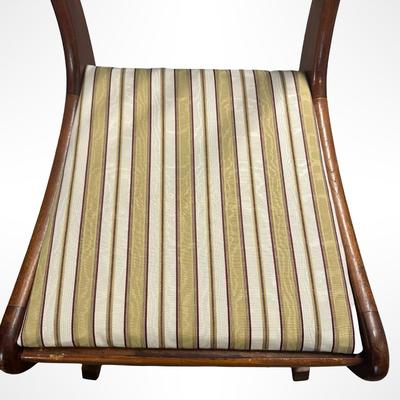 Vintage Wooden Carved-Back Rocking Chair