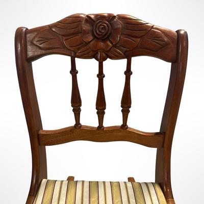 Vintage Wooden Carved-Back Rocking Chair