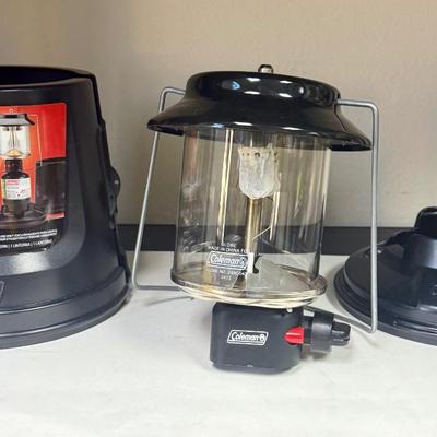 Sale Photo Thumbnail #450: New condition. Coleman QuickPack 2-Mantle Propane Lantern with an integrated carry case.