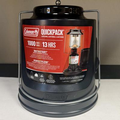 Sale Photo Thumbnail #448: New condition. Coleman QuickPack 2-Mantle Propane Lantern with an integrated carry case.