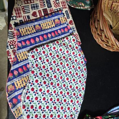 Oven and microwave safe Stoneware dishes with an assortment of themed basket cloths, small cookbooks, and a red pepper salsa dish