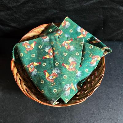 Oven and microwave safe Stoneware dishes with an assortment of themed basket cloths, small cookbooks, and a red pepper salsa dish