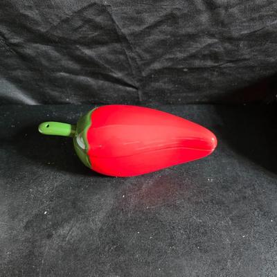 Oven and microwave safe Stoneware dishes with an assortment of themed basket cloths, small cookbooks, and a red pepper salsa dish