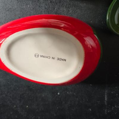 Oven and microwave safe Stoneware dishes with an assortment of themed basket cloths, small cookbooks, and a red pepper salsa dish