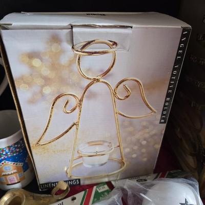 Christmas mugs, and Holiday cheer home decor including tablecloth, stationary and more - some brand new!