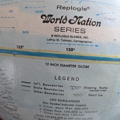 Replgle World nation series 12" diameter globe - LeRoy Tolman - with two America themed puzzles new in the bags