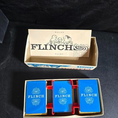 Board games - poker chips - card shuffler machine - Flinch - Dominoes and a deck of cards