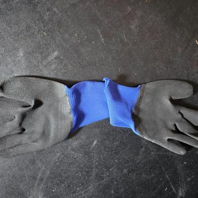 Two brand new deck brackets - a nice sprinkler - work gloves and a Polaroid digital picture frame with outdoor temperature display