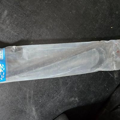 Two brand new deck brackets - a nice sprinkler - work gloves and a Polaroid digital picture frame with outdoor temperature display