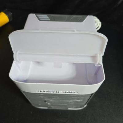 Mr. Heater Propane heater with a flashlight and an Arctic air ultra fan