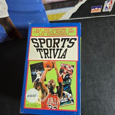 1990 Starline Inc. Chicago Bulls Licensed to Jam poster - Denver Nuggets Anthony poster and a sports trivia book set