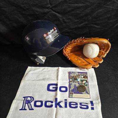 Baseball - brand new Rawlings batter helmet - leather baseball glove with ball and Rockies memorabilia