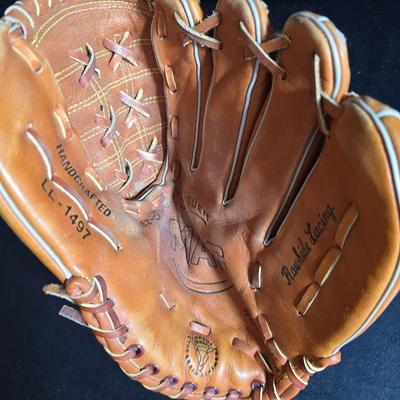 Baseball - brand new Rawlings batter helmet - leather baseball glove with ball and Rockies memorabilia