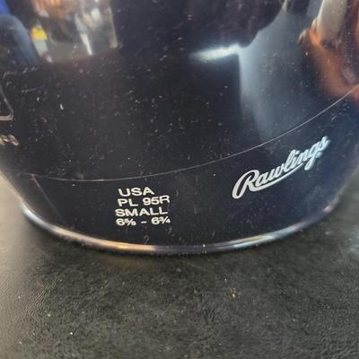 Baseball - brand new Rawlings batter helmet - leather baseball glove with ball and Rockies memorabilia