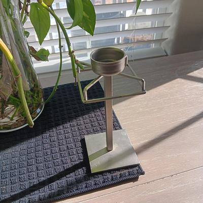 A LIVE PLANT, FAUX ORCHID AND 2 METAL CANDLE HOLDERS