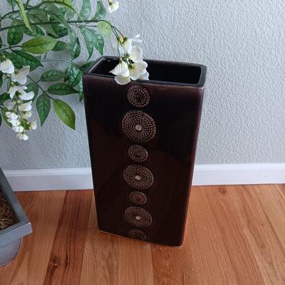 FAUX FLOWERING PLANT AND A FLOOR VASE